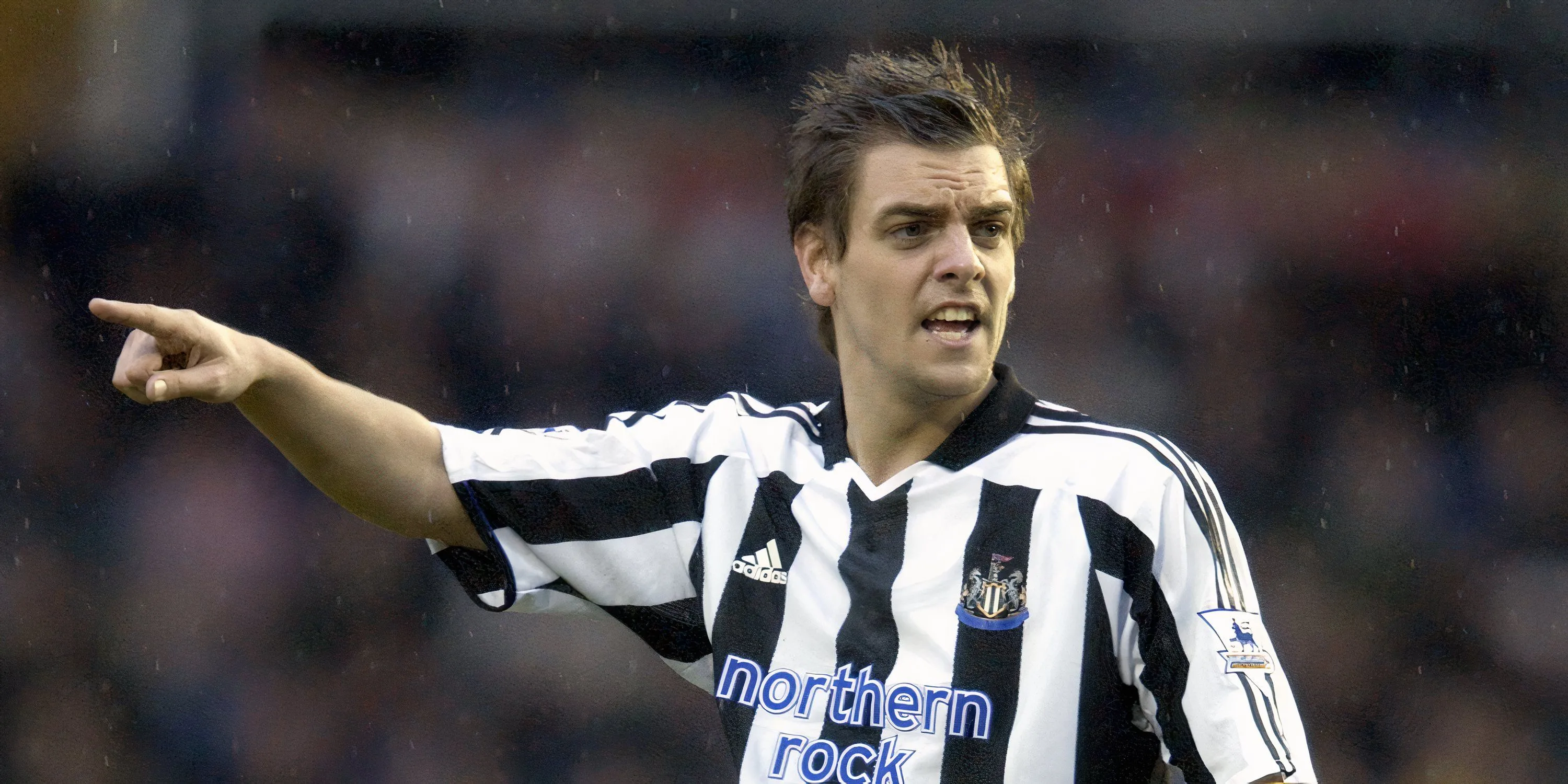 Jonathan Woodgate trong màu áo Real Madrid, thể hiện vẻ ngoài lịch lãm và quyết tâm